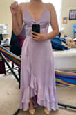 I would recommend this dress if you want something simple but an elevated look w/ a pop of color.
Shape/Fit: I'm 5'4 w/ somewhat of an hourglass body type. The dress hugs my waist but still gives me a lot of breathing room. In the photo I'm in 3.5 in heels, 4.5inch heels was the perfect length for me where the dress was barely touching the floor. The bust does hang open a little bit when I bend down but that is an easy fix with some fashion tape and pin.
Quality: I was skeptical because reviews said that the strings wouldn't last or broke. But when I received it, everything was in really good shape. The dress has a nice weight to it but isn't too light or heavy. The material is pretty cooling and great for spring/summer weather. I tested the strings to see if they would rip or tear and they didn't. Since the fabric is more satin like, the bottom of the dress did start sticking a bit to my legs but that's an easy fix by putting on some extra lotion. There weren't any loose strings or stitching. - Kat H.
