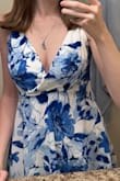 Wore this for grad pics, such a beautiful print! If you're smaller chested like me, you'll need to adjust the straps, which are hard to move. They're not constructed super well so you really have to yank to tighten them. I wore it without the belt, which made it very flowy and more babydoll-style. - Evelyn S.