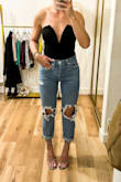 I ordered my usual size medium based on reviews and had to exchange for a large due to the length of the torso. I don't consider myself to have a long torso, but have found that I have to size up in most Lulus bodysuits. The large fits perfectly and I can't wait to wear it out. I love a versatile sexy but classy bodysuit that goes with jeans or dressier bottoms, and this is it! - Christina G.