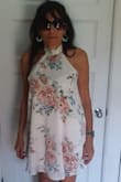 I have to agree with the comments in regards to the size. This dress runs a little large. I considered it and got it in small, which fits me  (usually wearing a M ) perfectly. - Marina H.