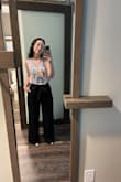 I am a short, petite girl with a big butt so finding pants that fit is always a challenge, especially this style, but these are pretty much perfect for me. My only complaint is that the pockets kind of bulge regardless of if you're tucking a shirt or not. But otherwise, I think the waist fit is great, the length is good (heels only, but that's expected). They are super comfortable, it's some sort of light linen but still looks professional enough. Wore this for a client event (outfit in the pictures) but I'm also excited to wear them out in the city with a crop top, too! For the short girls, I would definitely recommend trying these! - Alicia B.