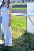 I love this jumpsuit! It runs a little small and I had to have about 4" taken off, but it's simple yet classy. It is a little sheer though, so make sure you have nude undergarments - Gena K.