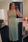 Ordered this for a wedding I am in that required a similar shade of green for my dress. I loved this dress, as it fit well and was flattering on me, even with my small chest. Absolutely love the material and also love the buttons on the side. Returned to go with a dress that was closer to what I needed for the event; would certainly consider purchasing in another color though! - Madison N.