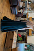 I really love the dress!! It's really darker than what I expected from the pictures.. but true to the numerous reviews. The fabric is nice, great quality, and nice adjustments. Forest Green. - Maxime L.