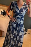 Omg this is so comfy and flowy I could wear it to bed. The strings/tie add a little more flair to the dress. SO LONG in me and I have a very hard time finding clothes long enough. Great for tall gals, shorter gals may be swimming in it. - Heather E.