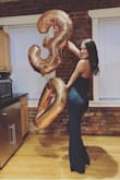 I love this jumpsuit it is so cute and flattering! It is really long so I wore heels with it and I'm already pretty tall so shorter girls may have to get it hemmed! Love the material too! - Lindsey B.