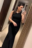I used this dress at a wedding and got a lot of compliments! The back is stunning and overall it looks super classy. Loved it! - Marisol V.