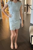 Very pretty dress. Good quality. Wish they sold a matching little sweater. - ANNA M.
