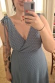 The dress is soooooo cute and comfy! It's adjustable on the straps, which means it fits all well. It's perfect for a day wedding or as a bridesmaid dress since it's simple yet elegant! - Clara G.