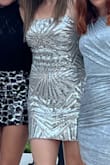 I needed a silver dress for a silver event and this was beautiful! Comfortable and looked much more expensive than it was. I am usually a small and bought a medium and it was fitted but not tight. I received many compliments from people who have high fashion sense! - Susanna S.