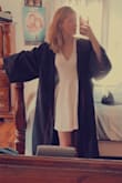 I love the open back on this dress it's my favorite feature! The material is thick so it's not see-through. I can't wait to wear it for graduation. - Abby O.