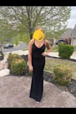 My daughter wore this in black for PROM. Very simple, elegant, and flattering. Material is thick with some stretch. The back is a perfect little pop of interest. My daughter is a 36B. Didn't quite fill it out but it was fine. This dress runs long! - Noelle S.