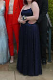 I really loved this dress! It fit pretty well, zipped up and all, but did feel a bit tight around my chest and abdomen. However, it was worth it! It looked great and I was able to take photos, dance, and eat in it! - Olivia R.