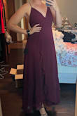 I wanted to give this dress a higher rating but sadly I'm giving it a lower score because my strap ended up breaking in the middle of the event and we had to tie it together.  It just seemed that the straps were very flimsy, especially for not being able to wear a bra with the dress.  Other than that it was a beautiful color and long enough for me which hardly happens being so tall. - Alicia B.