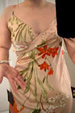 But as you can tell in the photo, it's almost the same color as my skin, and the top looks tight. It fit great though, it's just the wrap design that doesn't look flattering. If the dress was pinker, or the top had been designed differently to look more even, I might feel better wearing this. Hopefully, there are plans to release this in other colors? This could be a win for you but wasn't for me. - Terra P.
