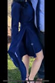 This dress is designed so perfectly! Extremely flattering, hugs all the right places. The color is a lot lighter than how it appears in the picture and the fabric feels different than I imagined but it was still a great purchase! I think my photo shows the color and material better. - Maggie T.
