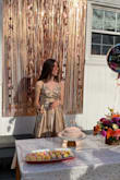 The dress was gorgeous, it was perfect for my 18th birthday party. I loved the color and it looks amazing in the pictures, it photographs really good. I also loved the fact that it had pockets. The material was nice and there's a black layer on the inside so that it's not see-through. The only thing I wasn't obsessed with was the neckline, it wasn't flattering on me and the back part of the skirt was slightly too short for me. The front was still gorgeous tho and as said before it made me look really cute at the party! - Eleonora D.
