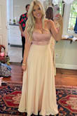 Wore this in a wedding last weekend and everyone loved it. Fits true to size and is very long. I am 5'9 and it was still long on me. Great quality and the colors were beautiful. - Lindsey W.