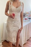Got this for my bridal shower, and everyone and myself loved it. I would say it runs a little big. Only complaint is be careful with the zipper. - Samantha W.