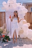 This dress was both classy and sexy! It was comfortable to wear through my bridal shower. - Angela S.