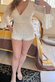 I wore this for my bachelorette, same as many other reviewers. I LOVE the sleeves and the fact that it's a romper, so I don't have to worry even though it's short. I gave it 4 stars instead of 5 because I did have to sew some parts to make it fit properly. First, the bust - major gaposis there, so I sewed it to where I was comfortable (you can see where in the photo). Someone with a larger chest would be fine. Second, the shorts - the stretchy under layer was longer than the outer lace layer, and I didn't like how that looked. I'm not a seamstress so I simply folded the under layer up and sewed it (just in the front, the back was fine). All this took maybe 30 minutes and then the outfit was good to go! Looked great all night. - Allison K.
