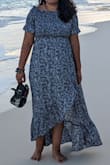 Super gorgeous dress and very flattering! I'm 5'3 and the dress just touched the ground, and with flats, it was maybe an inch too long but I didn't mind. - Neha G.