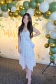 Wore this dress for my bridal shower and got so many complements! Such a classy and beautiful dress!! If you have a larger bust area I would size up as I am smaller chested and the dress was pretty snug around my bust area. Still fit great and loved it! - Lindsay M.