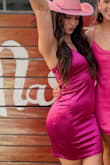 Wore this for my friend's bachelorette party and it was so comfy and cute!! I would say it does change color based on the lighting but mostly looks hot pink! - Lindsay M.