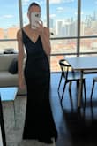 Ordered this a bridesmaid dress and overall its great! My only complaint is the shoulder straps were a bit tight on me and the dress came up a bit short especially with heels. I am 5.7.5" so dresses being short is not unusual. The material is really nice and thick with a bit of stretch. - Lana S.