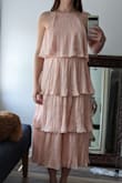I love the style of this dress and it's a great length. My only complaint is that the lining/seam/elastic at the first tier can be seen and it doesn't look like great quality. If the first-tier fabric was a little longer, it would hide the seam and work perfectly. I'm 36A, so I have a small chest, and it was still too short to hide the seams. Returned for a different dress. - Gabriella B.