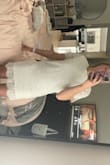I returned this dress. It was very pretty but the fit was kind of awkward. The lace at the bottom was much longer than I expected and the lace sleeves stuck out rather than just falling/hanging. - Victoria O.