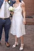 Wore it as a wedding dress. It was a good fit, although it would help to have a bigger bust to fill out the top part more. The top of the dress sometimes sagged in because of that (see picture). The waistline fit really well and the pockets were good and deep. It is very white and the lace pattern is kind of sparse, not a fine lace. The only complaint would probably just be that the zipper was difficult, it seemed to get stuck at the waist seam for no reason so I almost always needed a second person to zip / unzip. The fabric is a little bit stiffer than other lace dresses I have tried. - Natalie R.