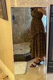 High quality. Neck is comfortable/not tight. 
Very figure flattering. Makes waist look small. - Carolina A.