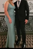 I received so many compliments on this dress and it fit so well! It is pretty long too, as I am 5'7" and I had to wear heels for it to not drag on the ground. - Anna N.