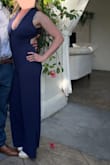 Wore this to a wedding in Santa Barbara and felt very sexy while still looking classy. I loved being unique from the traditional dress. The small fit me perfectly; I am curvy, but it accentuated all the best parts! I was very happy that I didn't even need to wear a bra, which is almost impossible having a DD chest size. But it was snug enough up top to hold everything in. The fabric hangs nice, the open back is sexy and the plunging neckline is gorgeous without being too revealing. Overall very pleased!!! - Heidi S.