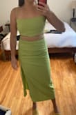The fabric is a little casual / jersey-esque, but I'm going to dress this baby up to be a bridesmaid in my friend's wedding. I have a small bust, and a wide chest,  I actually like that the top is a little longer on me. I also like how it's bunched at the gut area... very flattering. - Kelsey A.