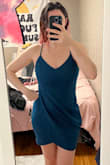 It fits so amazingly! The photo looks blue because of my lighting but the dress is a really nice true teal. - Stefanie F.