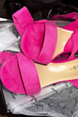Literally the pictures are soft baby pink cherry blossom pink. I was NOT EXPECTING stripper hot pink heels. I am so angry and upset because I got these for my graduation lmfao.They also smelt disgusting like dye and chemicals. How are these the same shoe!!!!! - Kiara M.