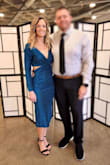 I got this dress for a Spring formal wedding. It's incredibly comfortable, stretchy, and breathable. You can adjust the waist some so it shows more or less of your waist/low back, and has a nice low slit to just above the knee. It's more shiny and blue-ish in person, which I love. I have muscular arms so the sleeves were fitted, I also have muscular thighs so it was more form fitting but looked great! I got this dress at a great sale price so if you are wondering whether to buy it, do it. - Sarah H.