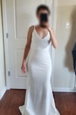 This is a beautiful dress that would make a lovely option for a simple, classic wedding look. Obviously, the length is too long for my height, but that's nothing an alteration can't fix. I only wish that some of the lines from the layer underneath were less noticeable, but it's not a big issue overall. - Christina D.