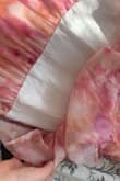 I like the look of Lulus clothes but they always seem to find a way to cut corners. I guess that's to be expected from fast fashion but not for a dress that costs approx 100 CAD with conversion rates and clearance fees. I'm disappointed that the second layer of fabric is half this cheap white material. The pink fabric is sheer so there is a lining beneath both layers but you can see this weird white chunk under the top layer. It looks cheap. Otherwise this could be a great dress.  Sad :( - Bryn W.