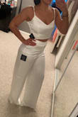 Absolutely loooove this set. Fits pretty TTS, although still roomy right below the waist. I'm 5'3" and the pants are still floor length even with heels. - Allison B.