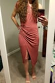 This dress is so soft and comfy! The slit is pretty high but it's cut in a way that I don't think there's any danger of flashing anyone. I also love that it actually fits as a midi even on someone short like me. Most Lulus midis have been longer than this. I will say there is a little bit of extra fabric on top in the back that puffs out a bit for me but it doesn't look bad and I think even a slightly bigger bust would take that away. - Meghan L.