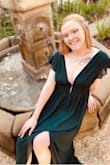 I wore this gorgeous dress to a family wedding and everyone loved it. The shoulders were a little loose and kept sliding down my arms and that was a little annoying but it fit perfectly otherwise!! I wore pasties under it because the deep v is so deep that I couldn't find a bra to go with it. Would recommend this one to anyone!! - Rebekah H.