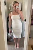 I really love this dress! The material won't crease when I sit and is the perfect white. It's shorter than my grad gown, but looks more elegant with a bit more length. - Briley O.