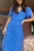 I LOVE the blue of this dress, it makes my eyes look even bluer. The fabric is light and drapes and flows beautifully. I thought the dress might need minor tailoring, but I was wrong. It fits perfectly! My new favorite dress! - Olivia L.