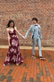I wore this dress for prom&it is such a beautiful dress! I wore an XS and it fit so nicely:)

Pros: 
-wrap dress so it's adjustable to you and I love that
-the style is flattering on everyone
-it's nice and long! I'm fairly tall and it def hit the floor and I could wear heels with it

Cons:
-we had to sew some snaps by the chest area, there's already a snap there but it's a little low and loose so we added another for extra security
-added another snap at the slit opening didn't want to flash the world haha

I loved this dress so much. And I'm pretty sure I'll be able to wear it again to weddings or something else bc it's super versatile! - Erin M.