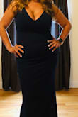 Absolutely beautiful on! I bought it for a June wedding, the material is a little heavy for June. Decided not to wear it for this particular event but Im keeping it for a future event. - Sofia V.