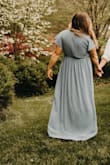 I wore 2.5" heels and it was the perfect length. The dress was flowing enough to be romantic but not out of control in the wind. Perfect amount of cleavage, never once had to adjust that area. Comfortable sleeves and airy material. - Martha T.