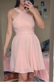 I love the color of the blush pink! It's subtle, but still has that touch of pink to add color. I originally ordered a medium, but it was huge on me, so I exchanged it for a small! It was pretty loose around the bust and under the shoulders and much longer than expected. The small fits much better, and I can't wait to wear it to my graduation! - Sophia D.